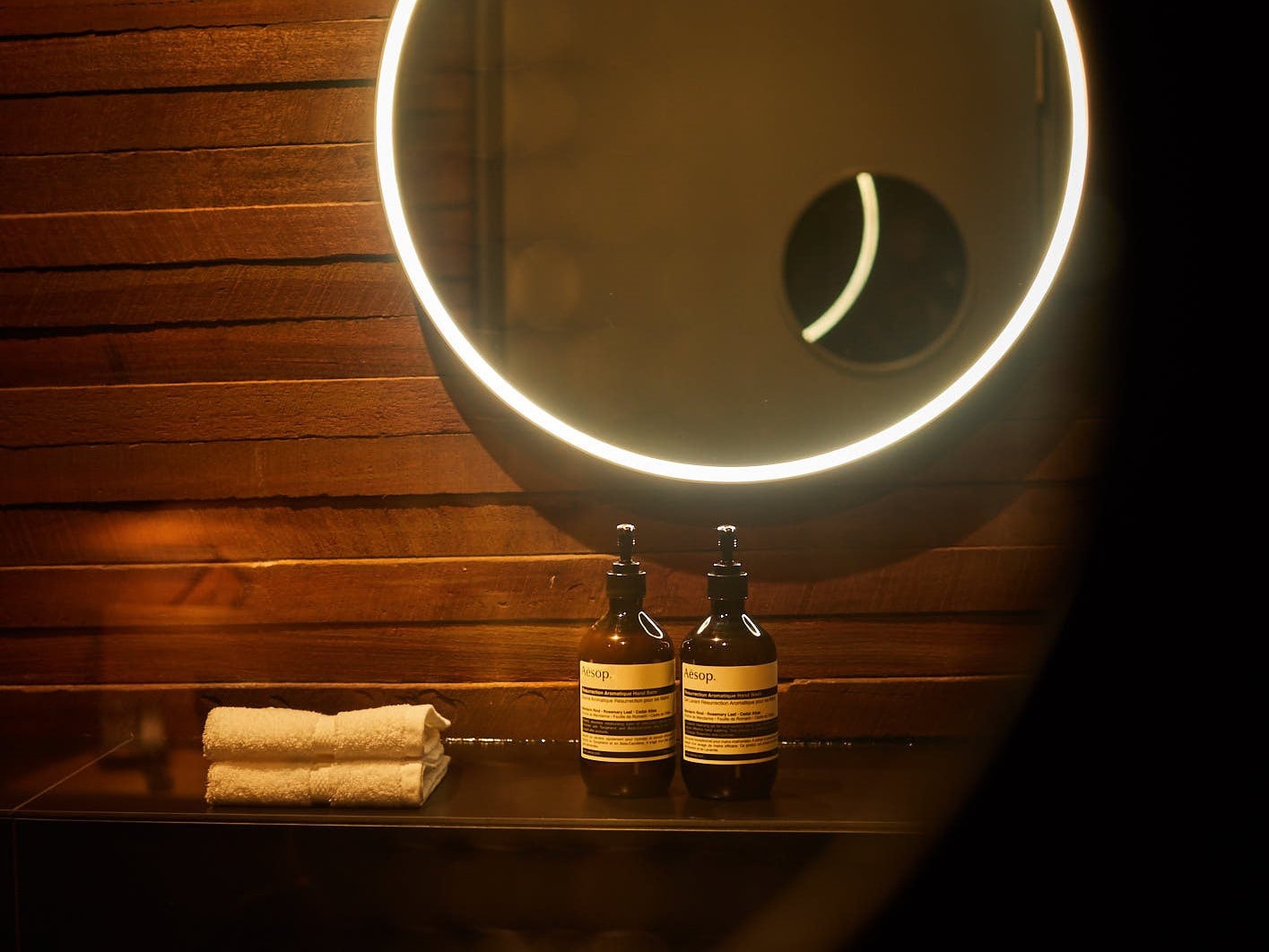 Luxury bathroom experience inside the timber granary. Aesop personal amenities