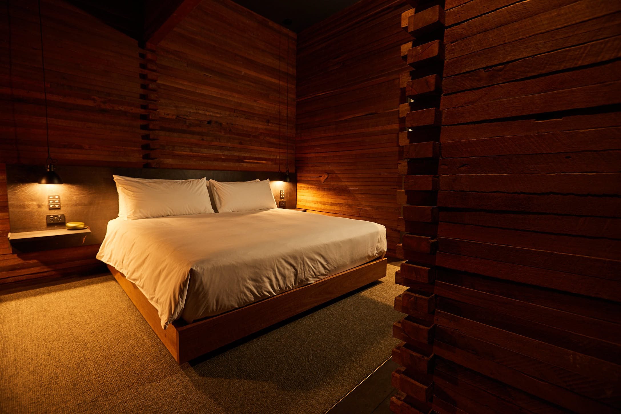 The rough-sawn solid jarrah walls featured in Silo Rooms